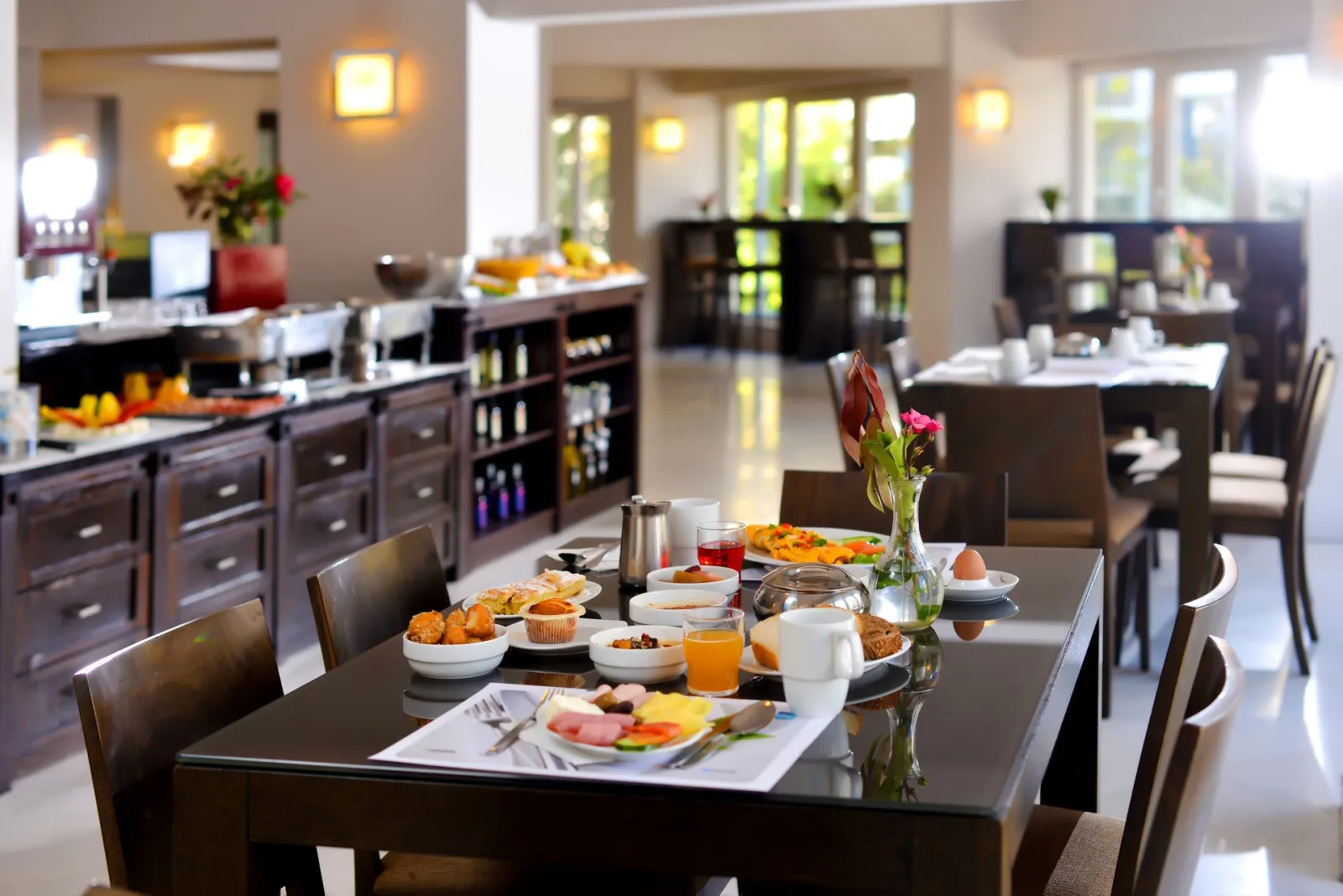 A warm kalimera in a sunny comfortable breakfast hall