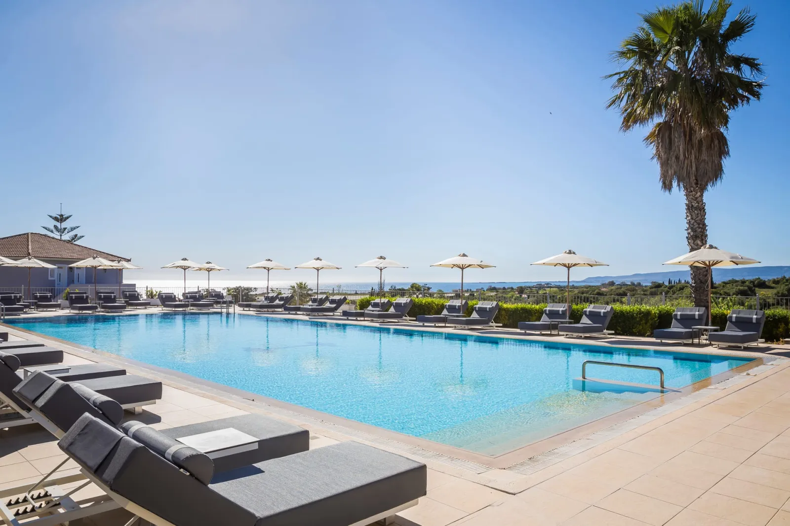Astra Village Hotel & Suites