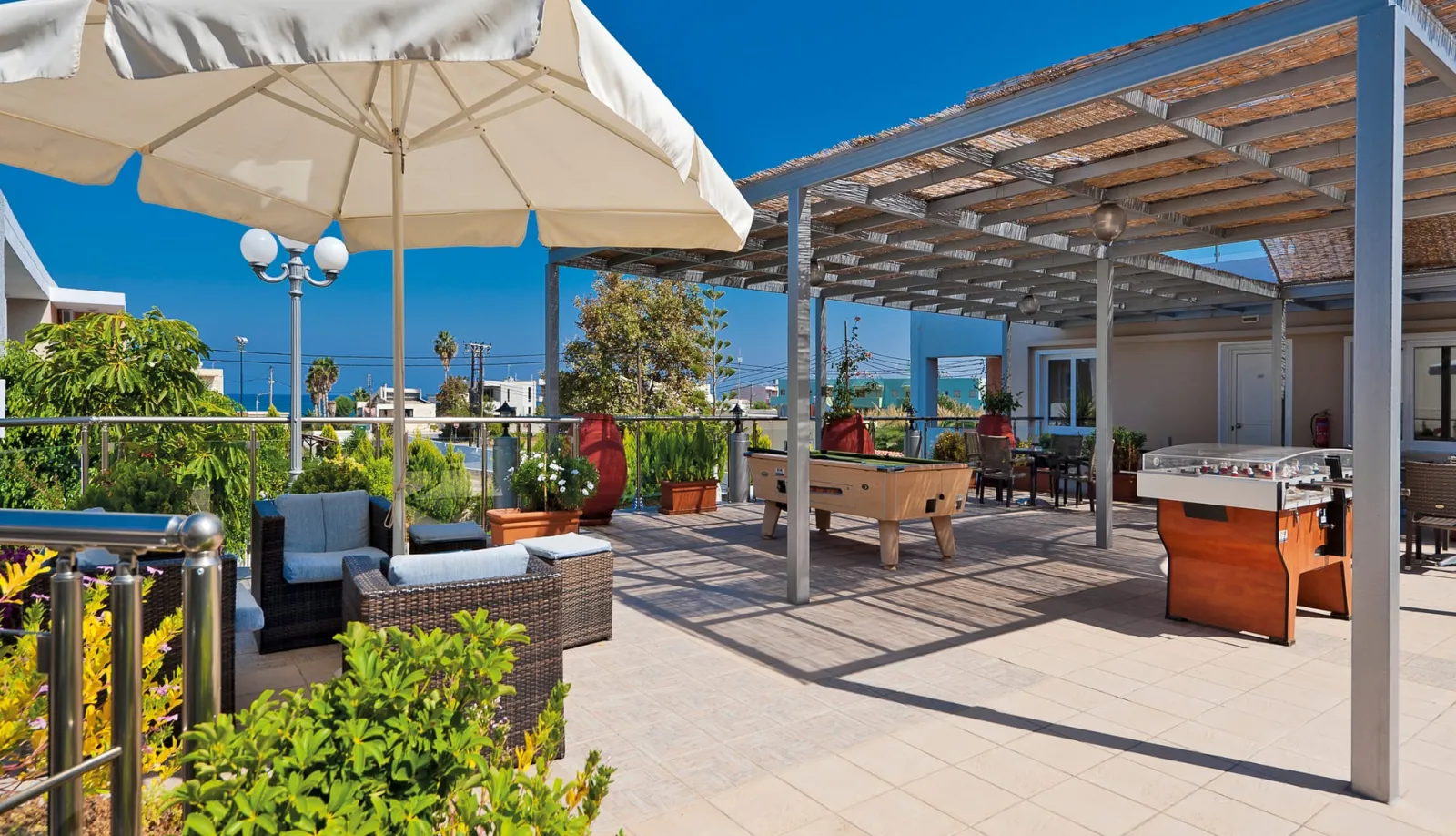The following facilities are located 150 meters from the property and include a shared swimming pool, pool bar, billiards, and foosball table.