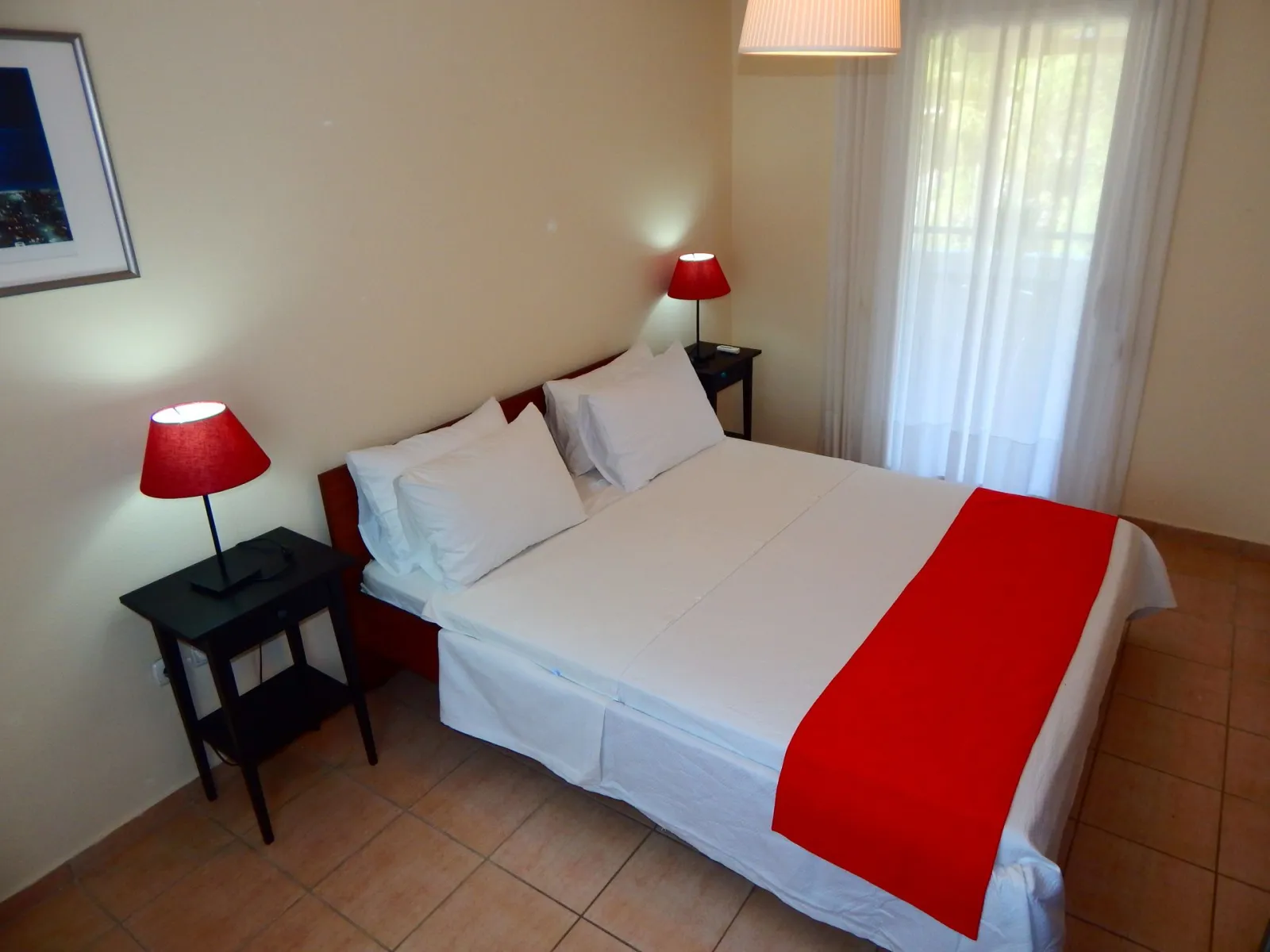 Kripis house villa Pefkohori.Second level-Double room in first floor -big balcony with  view to the garden.A/C.