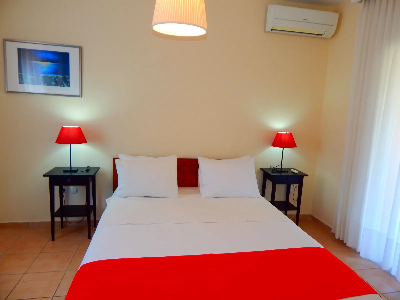 Kripis house villa Pefkohori.Second level-Double room in first floor -big balcony with  view to the garden.A/C.