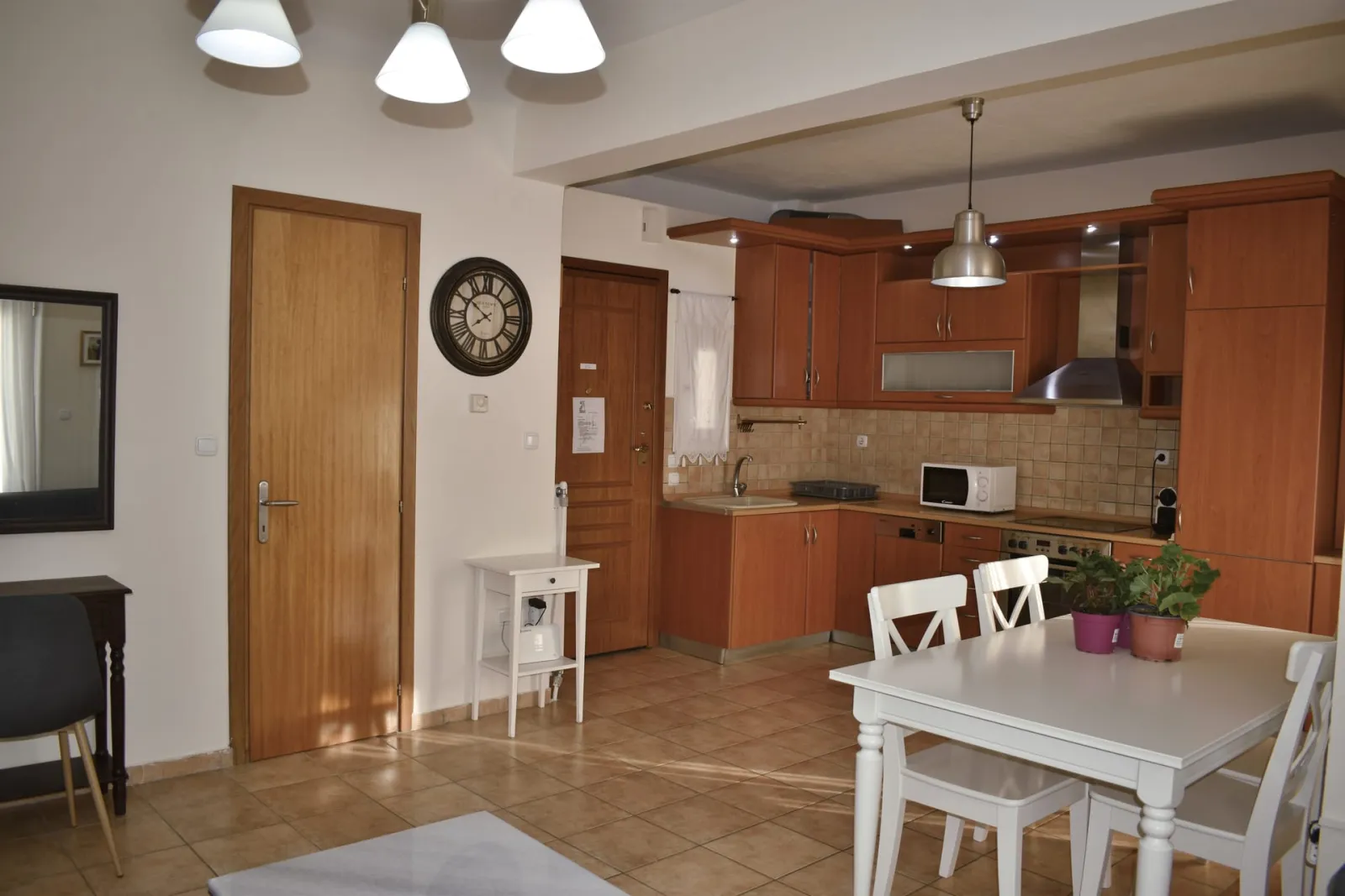 Kripis house villa PefkohoriFirst level- Sitting room with kitchen and private small garden. Also small WC in this level- A/C