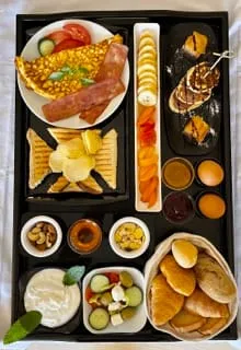 Enjoy your private breakfast in your room with daily homemade greek products!