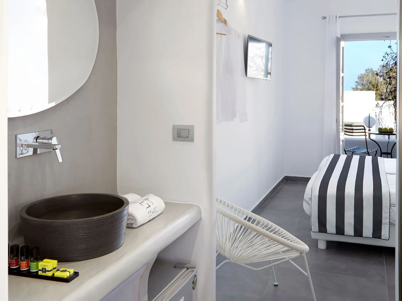 Elegant White Deluxe Room with Private Balcony