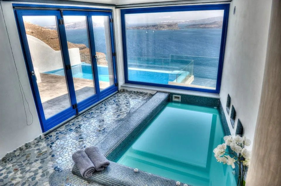 Astarte Suite with private infinity pool indoor couples Jacuzzi and private panoramic terrace with sea/caldera/volcano view