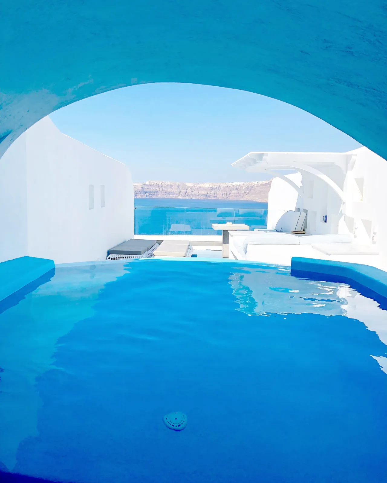 Cave Pool Suite with private cave pool indoor couples Jacuzzi and private panoramic terrace with sea/volcano/caldera views