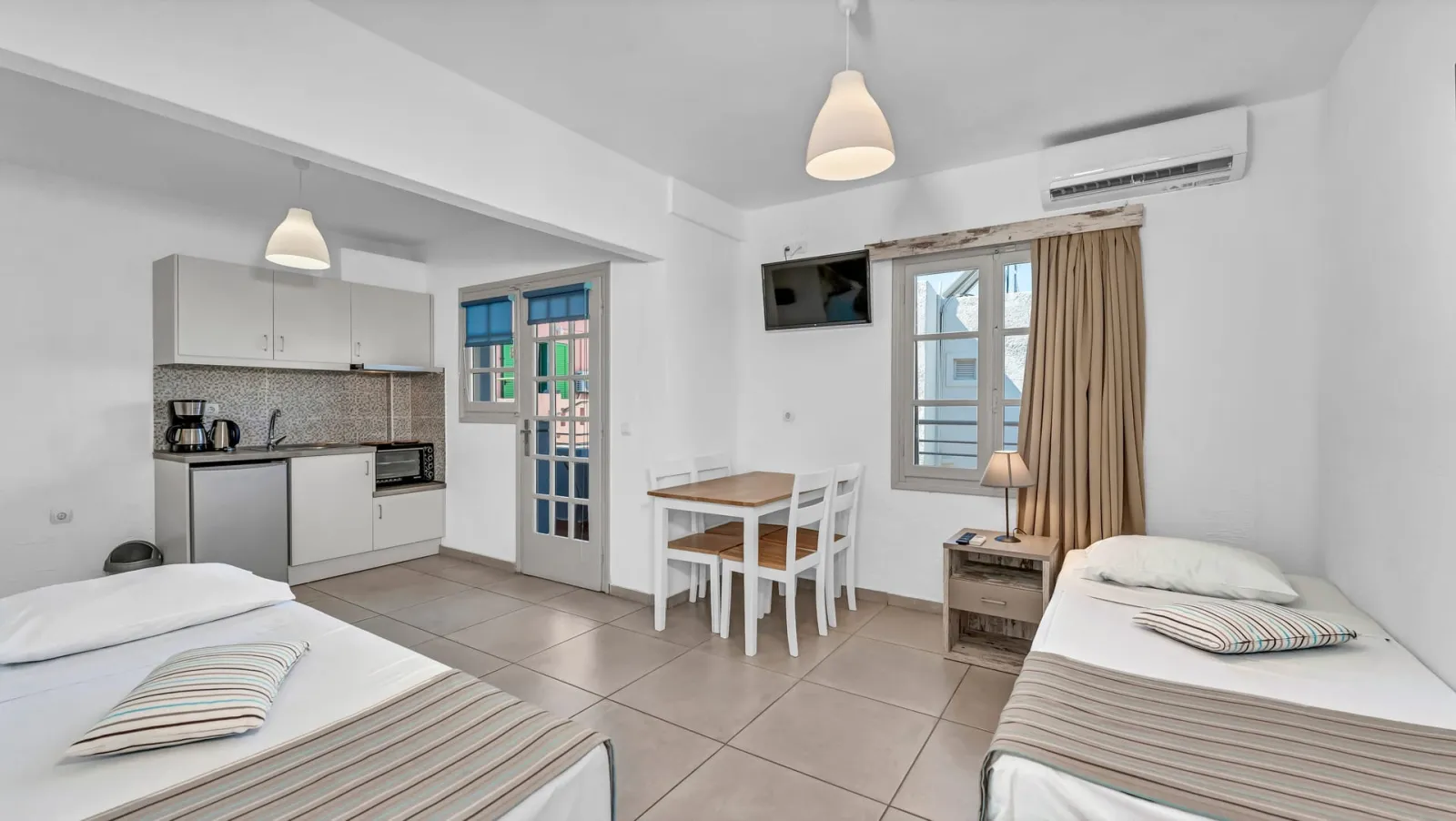 Junior Suite (Quadruple) Bedroom & Living Room