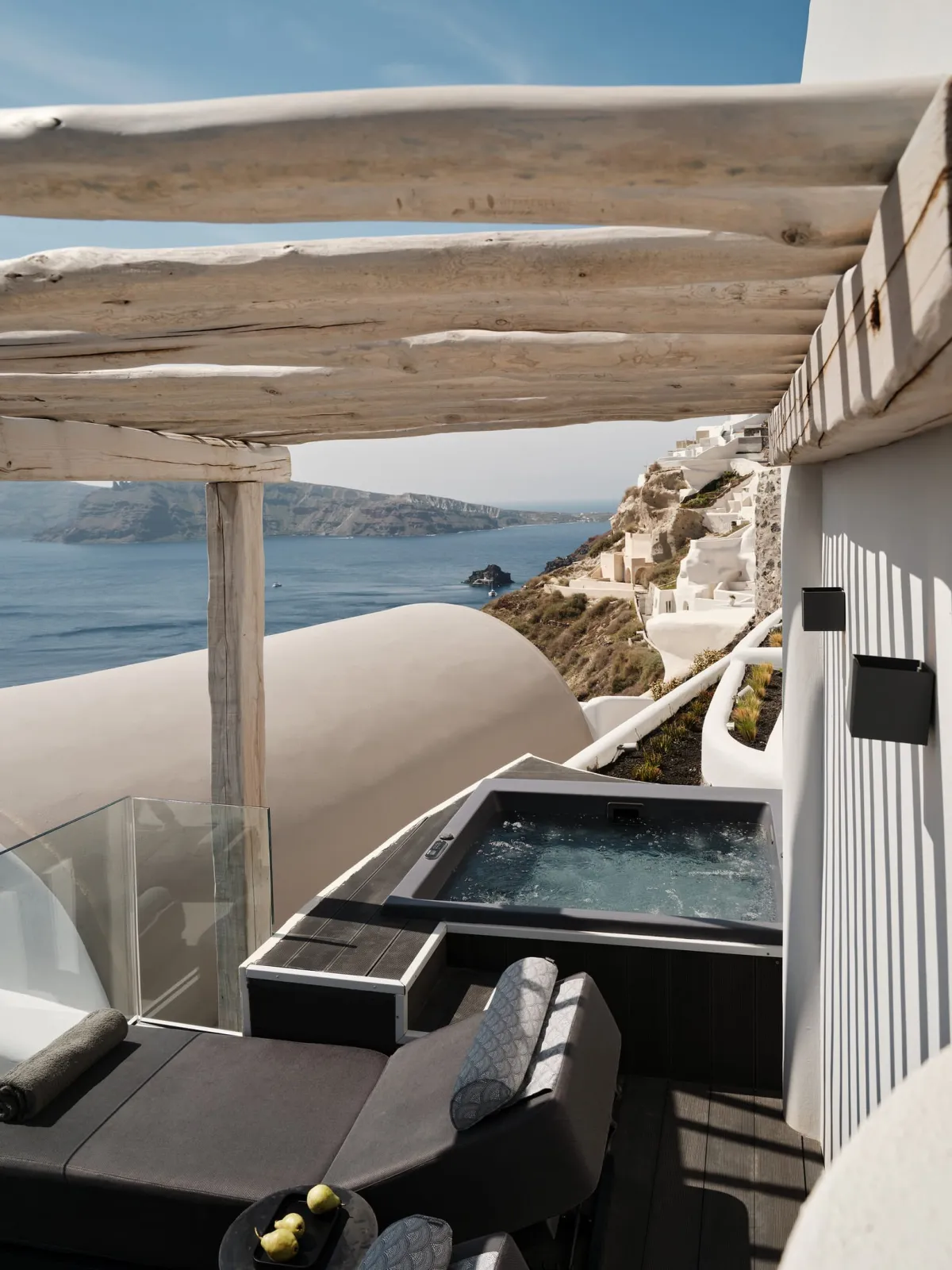 Cave Suite with outdoor hot tub and sea view