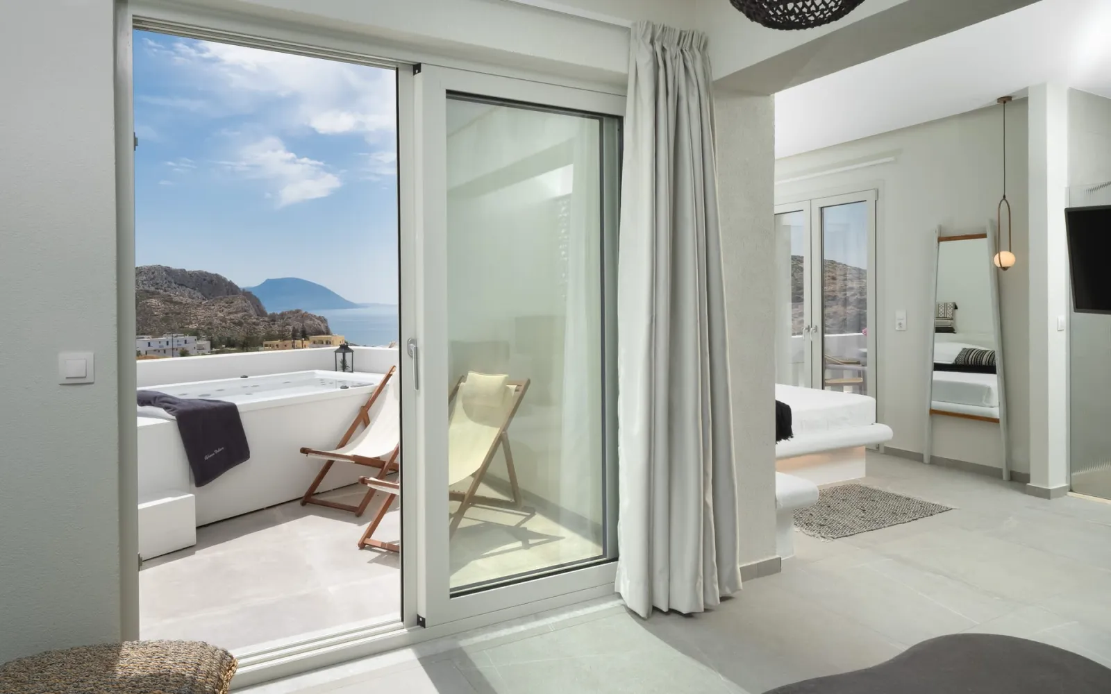 Luxury Suite with Outdoor Jetted Tub & Sea View