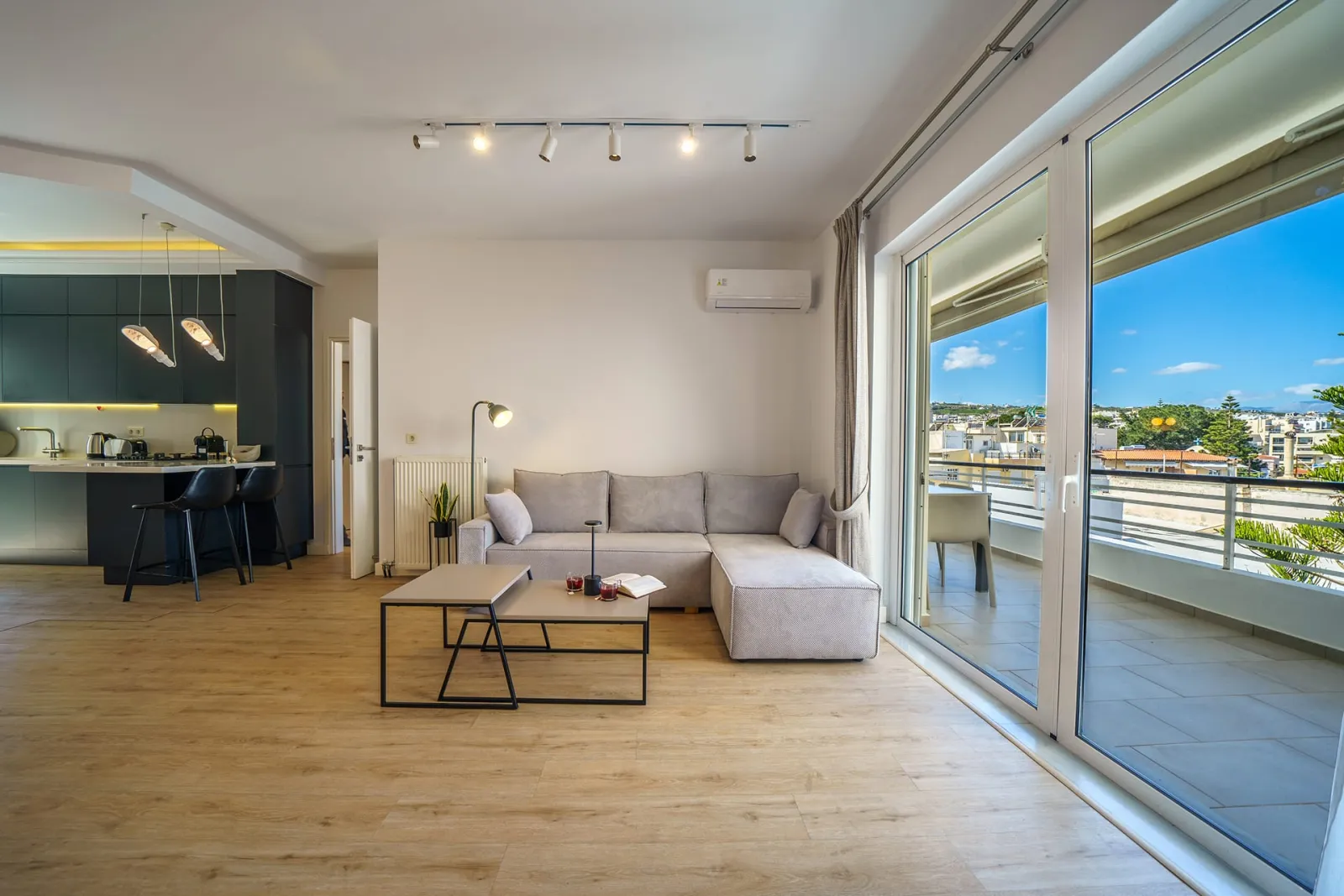 Spacious living room area with majestic view- a perfect bright and airy space to relax and recharge.