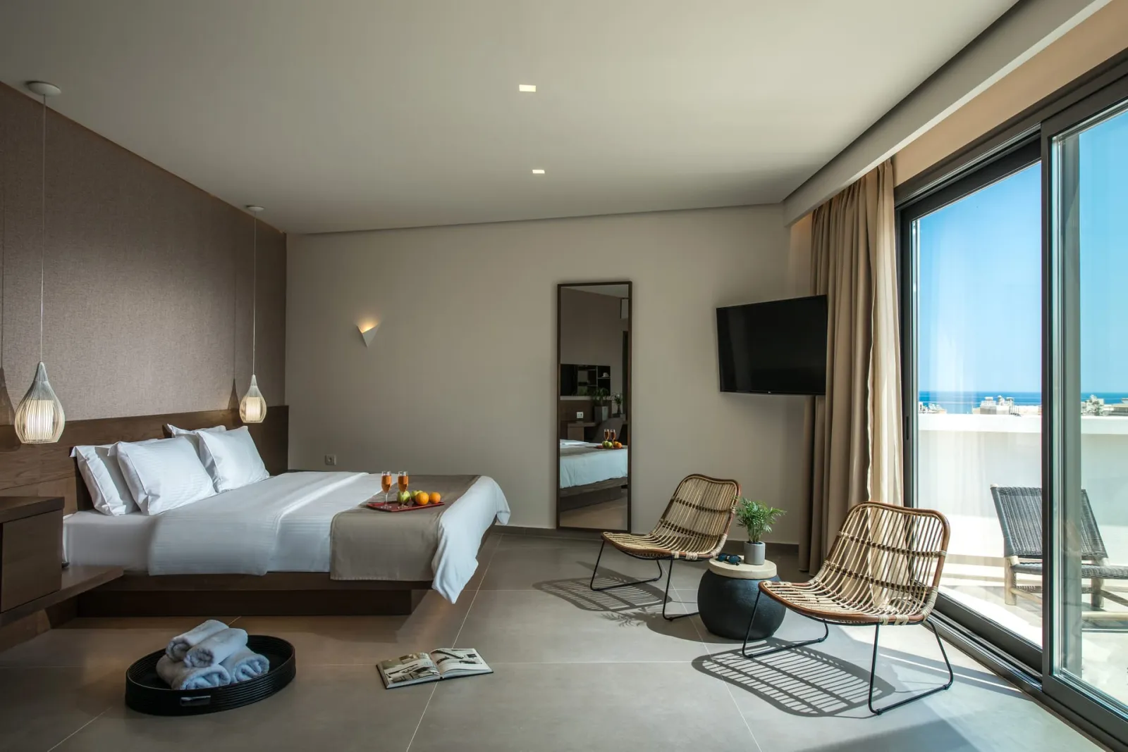 Junior Suite with Outdoor Jetted Tub and Side Sea View